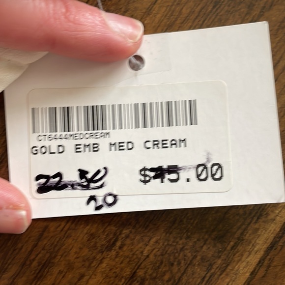 Off white with gold stripe across the chest. Ruffled sleeves. Never worn. - Picture 2 of 2